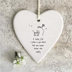 Wobbly round heart-A baby fills a place
